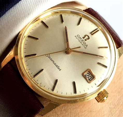 omega seamaster 18k gold.